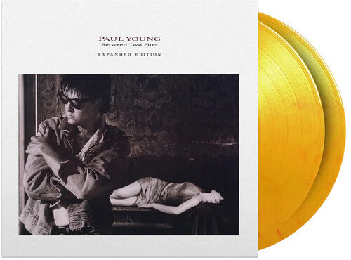 Paul Young: Between Two Fires - Limited & Expanded 180-Gram Flame Colored Vinyl ( Vinyl )
